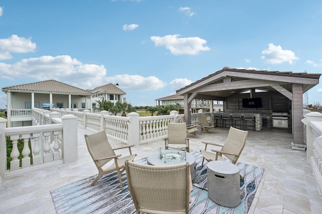 view of patio / terrace with an outdoor bar