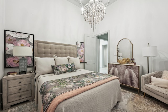 bedroom with a notable chandelier