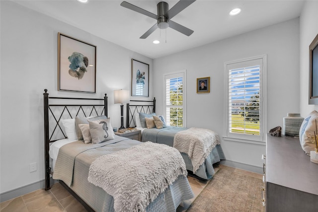 bedroom featuring ceiling fan