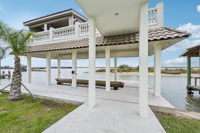 dock area with a water view