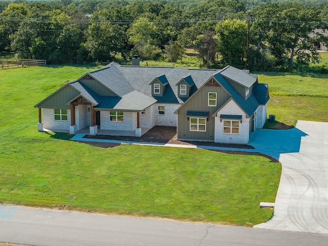 view of front of property with a front lawn