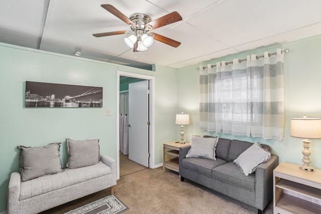 living room with light colored carpet and ceiling fan