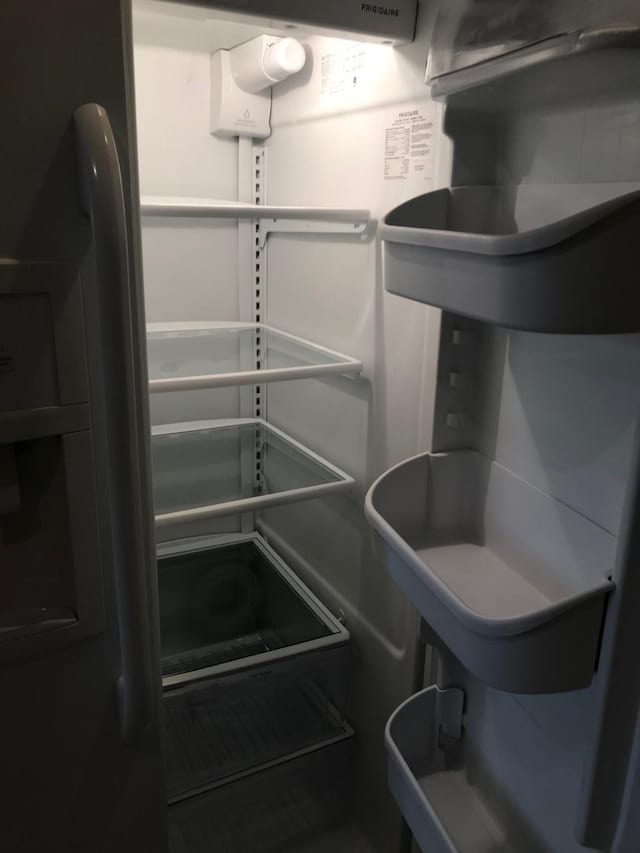 room details featuring fridge