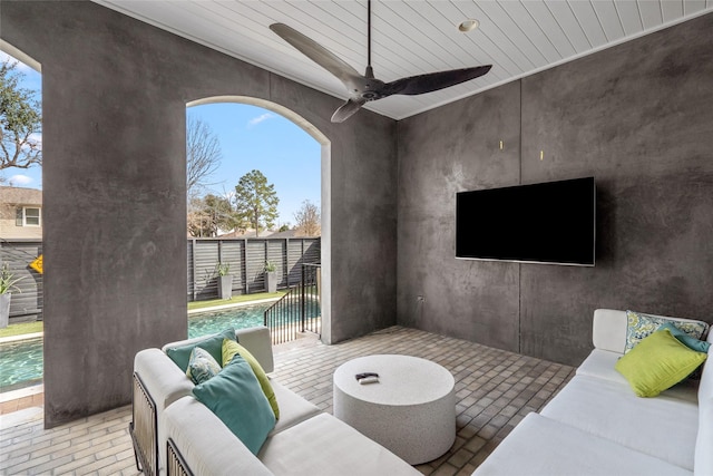 view of patio / terrace with an outdoor living space and ceiling fan