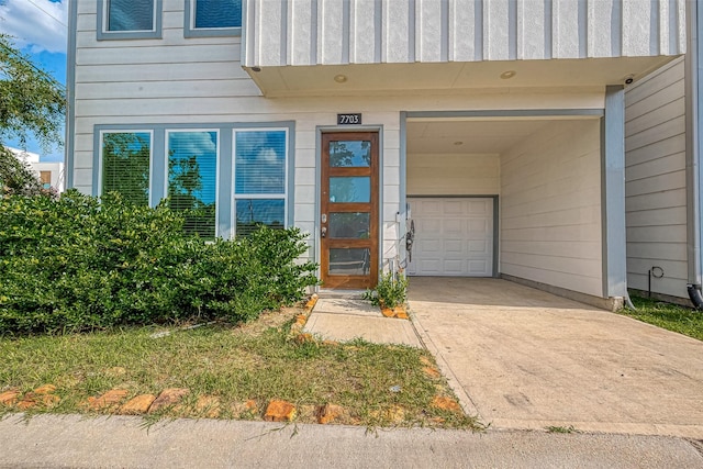 property entrance with a garage