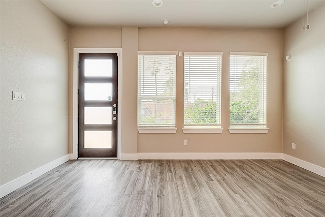 entrance foyer featuring light hardwood / wood-style floors