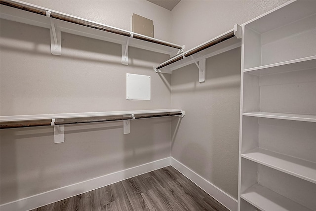 walk in closet featuring wood-type flooring