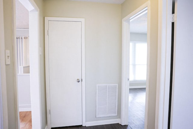 hall featuring dark hardwood / wood-style floors