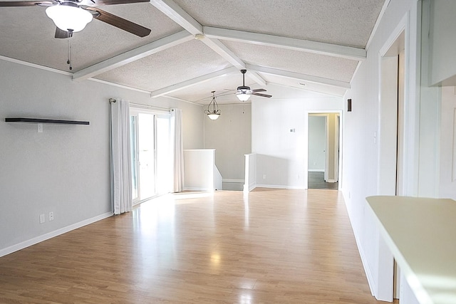 unfurnished living room featuring vaulted ceiling with beams, ceiling fan, a textured ceiling, and light hardwood / wood-style flooring