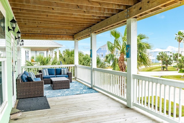 deck featuring outdoor lounge area