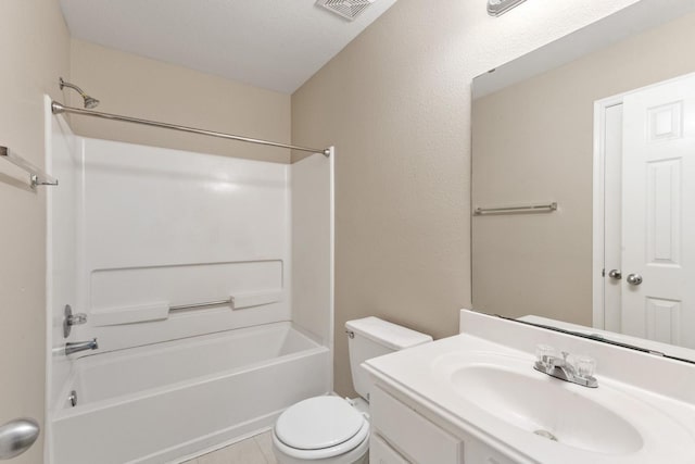 full bathroom featuring vanity, tub / shower combination, tile patterned floors, and toilet