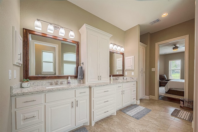 bathroom with vanity and ceiling fan