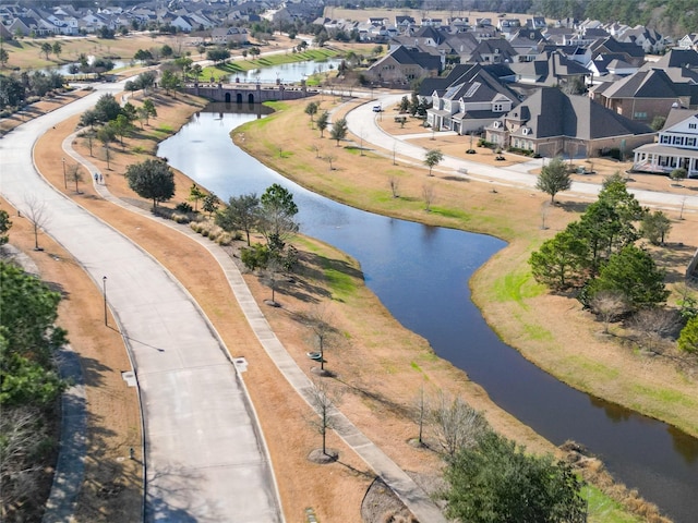 aerial view with a residential view and a water view