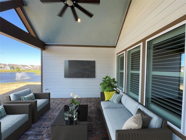 view of patio with outdoor lounge area and a ceiling fan