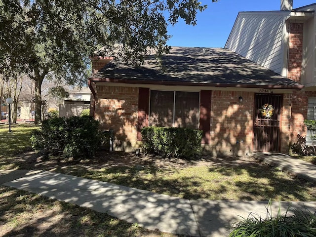 view of home's exterior featuring a lawn