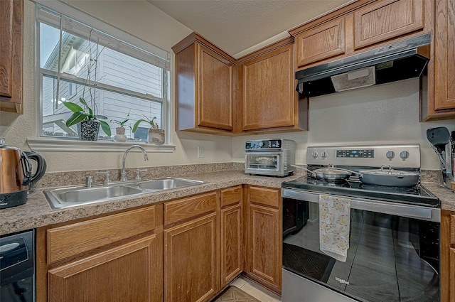 kitchen with sink and stainless steel electric range