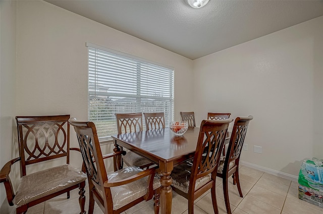 dining room with light tile patterned floors