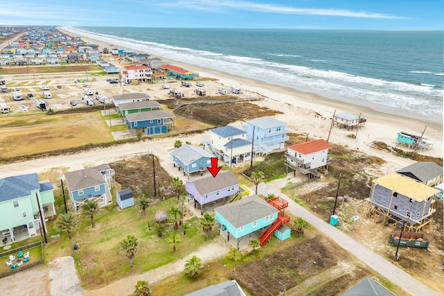 aerial view with a view of the beach and a water view