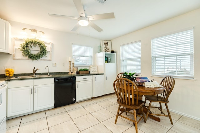 kitchen featuring light tile patterned floors, sink, dishwasher, ceiling fan, and white cabinets