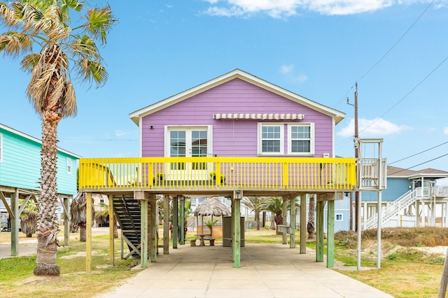 coastal home featuring a carport