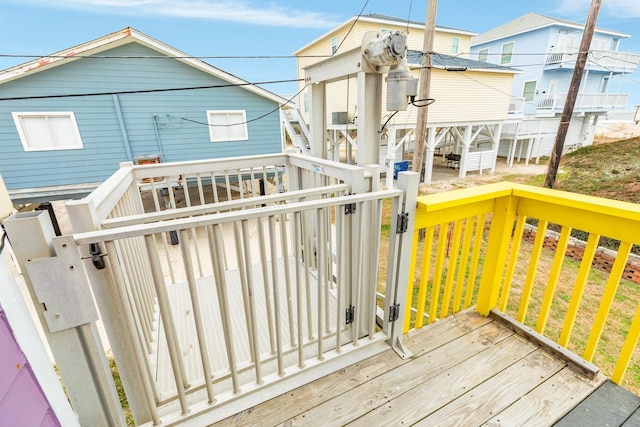 wooden deck with a yard