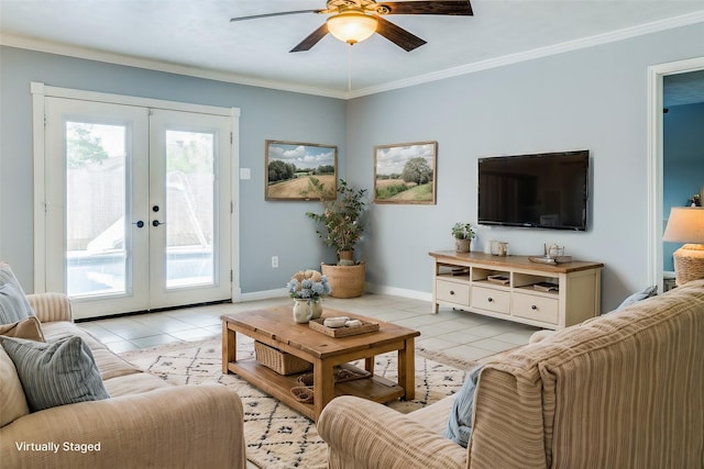 tiled living room featuring crown molding, plenty of natural light, and french doors