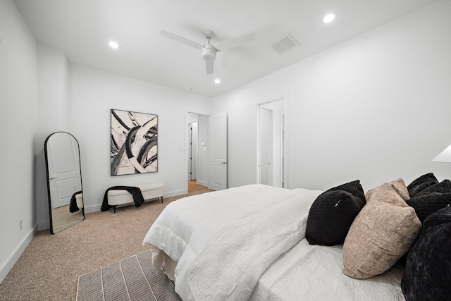 carpeted bedroom featuring ceiling fan