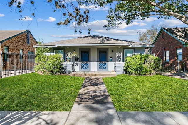 bungalow with a front lawn