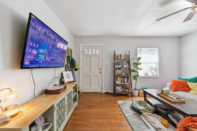 entryway with hardwood / wood-style flooring and ceiling fan