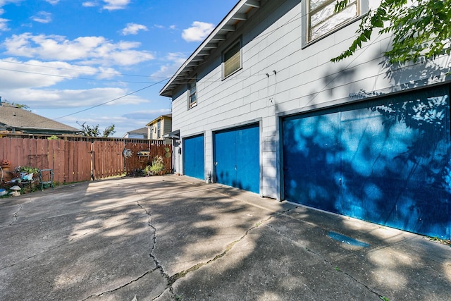 view of home's exterior with a garage