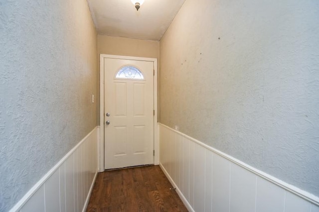 doorway to outside with dark hardwood / wood-style floors