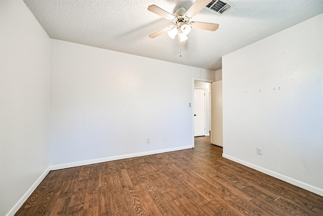 unfurnished room featuring ceiling fan, wood-type flooring, and a textured ceiling