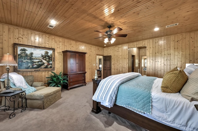 carpeted bedroom with wooden ceiling and ceiling fan