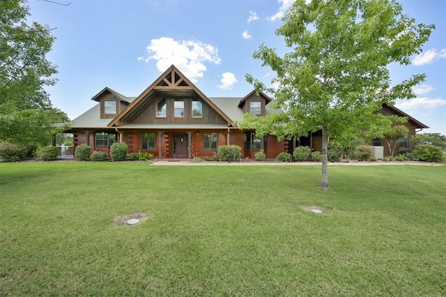 craftsman house featuring a front lawn