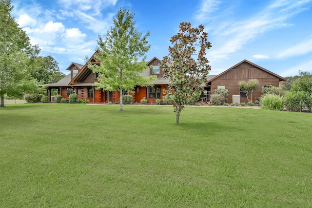 view of front of home with a front yard