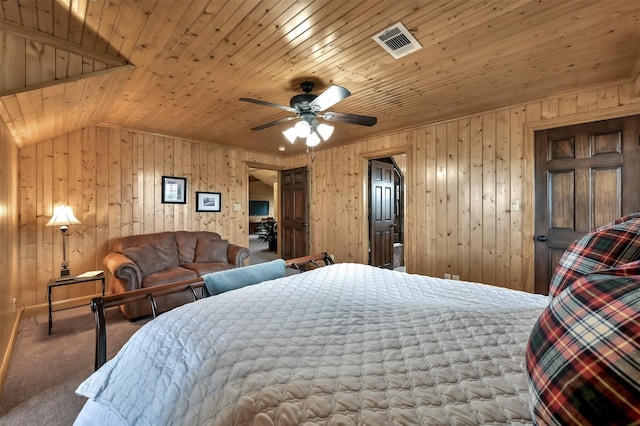 carpeted bedroom with wooden ceiling