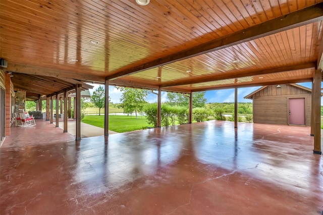 view of patio featuring a storage shed