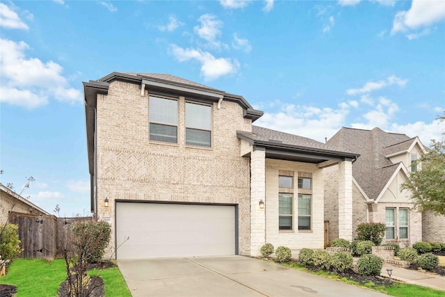 view of front of home with a garage