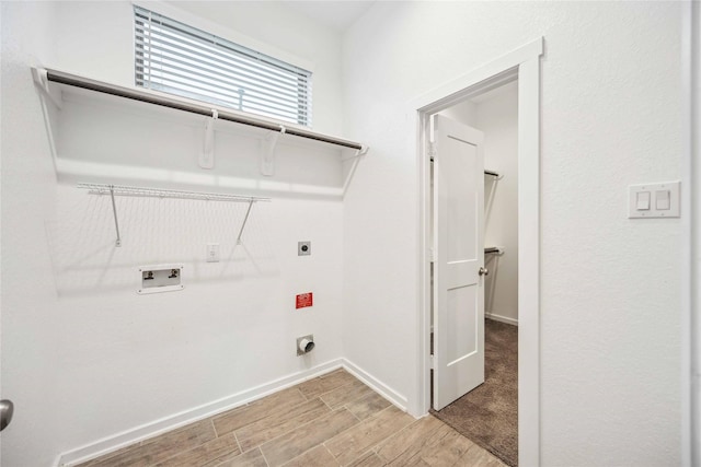 laundry room with hardwood / wood-style flooring, washer hookup, and electric dryer hookup