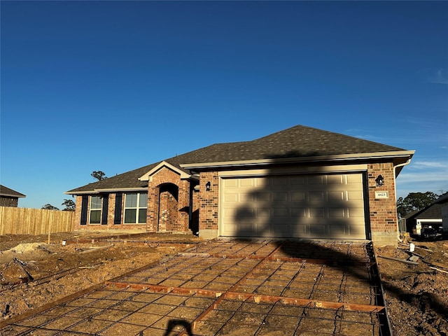 ranch-style house with a garage