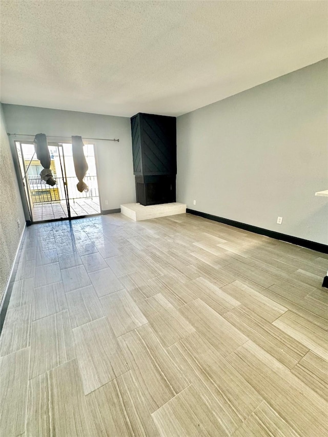 empty room with a textured ceiling