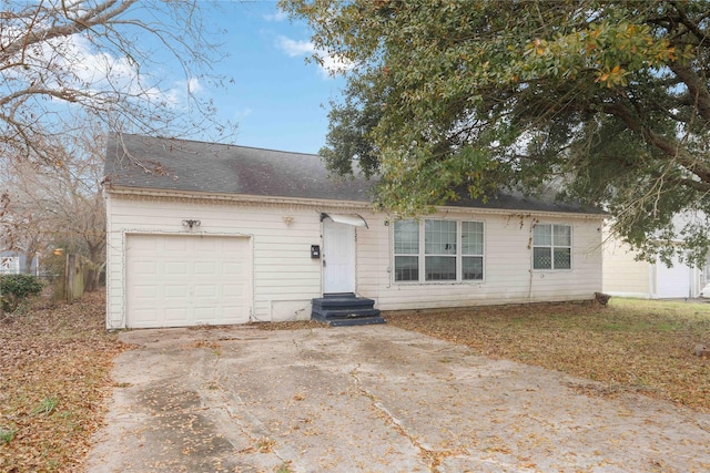 ranch-style home with a garage