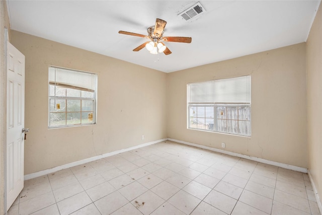 empty room featuring ceiling fan