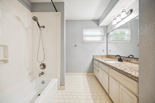 bathroom featuring vanity, shower / tub combination, tile patterned floors, and a textured ceiling