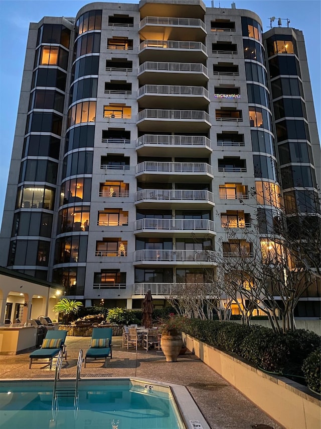 view of property with a community pool