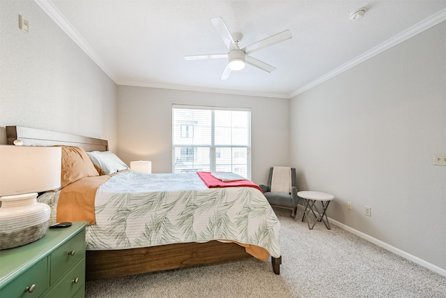 bedroom with crown molding, ceiling fan, and carpet floors