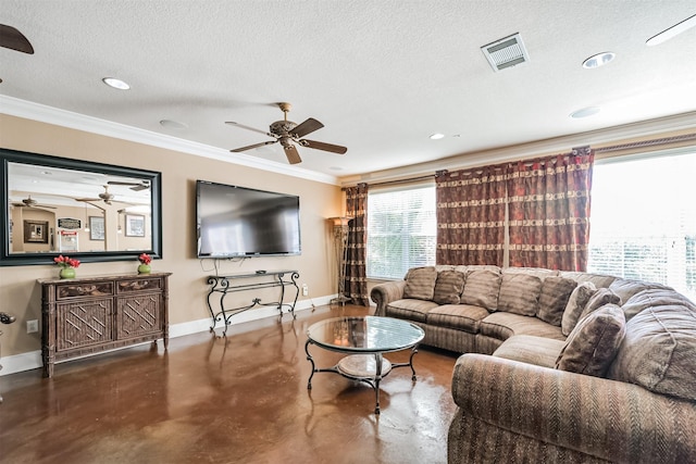 living room with crown molding, ceiling fan, concrete floors, and a textured ceiling