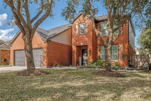 view of front of home with a garage and a front yard