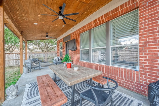 view of patio featuring an outdoor living space and ceiling fan