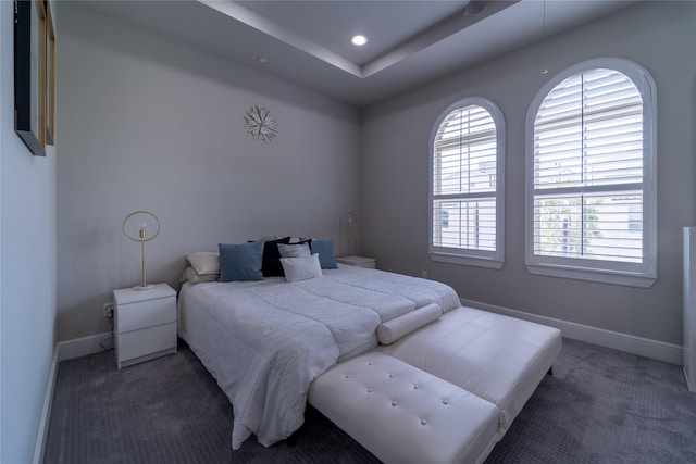 bedroom featuring dark colored carpet